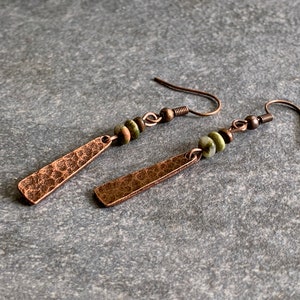 Hammered copper earrings with green unakite and wood beads