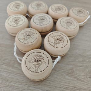 yo-yo in legno, yo-yo incisi al laser, yo-yo personalizzati, dettagli battesimo, bomboniere, dettagli battesimo, dettagli battesimo, battesimo