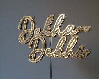 A Bangladeshi inspired luxury cake topper for your engament Dekha Dekhi cake.