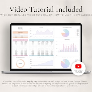 May include: A laptop screen displaying a Google Sheets spreadsheet with various charts and graphs. The spreadsheet is titled "2023" and includes tabs for "Overview", "Savings Goals", "Year Overview", "Savings Progress", "Net Savings", "Income Breakdown", "Cash Flow", and "Expenses Breakdown". The spreadsheet is designed in a light blue and pink colour scheme. A YouTube play button icon is displayed in the bottom right corner of the screen with the text "Watch on YouTube".