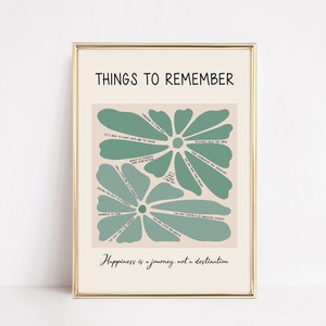 May include: A printable wall art poster with a light brown background and two green flower shapes. The poster features the text "Things to Remember" and a list of positive affirmations, including "Tomorrow is a new day", "It's okay to start over and try again", "Mistakes help you grow", "You are loved and worthy", "You are capable of amazing things", "Happiness is a journey, not a destination".