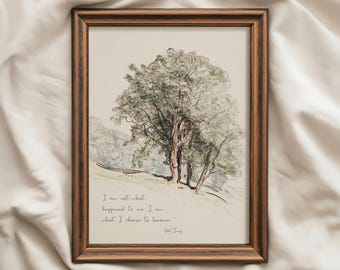 May include: A framed wall art print featuring a sketch of a large tree on a hillside. The text reads: I am not what happened to me. I am what I choose to become. Carl Jung. The frame is dark brown wood with a simple profile and a rectangular shape.
