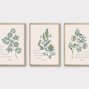 May include: Three printable wall art prints with a cream background and gold frames. Each print features a green floral design with a quote by Carl Jung. The first print says "The curious paradox is that when I accept myself just as I am, then I can change". The second print says "I am not what happened to me. I am what I choose to become". The third print says "It all depends on how we look at things, and not how they are in themselves".