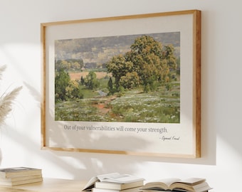 May include: A framed landscape art print with a light wood frame. The artwork depicts a field with trees and a quote that reads, "Out of your vulnerabilities will come your strength." - Sigmund Freud.