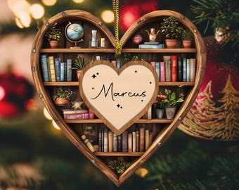 May include: Wooden heart-shaped ornament with a bookshelf design and a personalised heart-shaped tag that says "Marcus".
