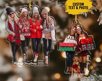 May include: Clear acrylic Christmas ornaments featuring photos of groups of women. One ornament has the text "Merry Christmas 2025". The other ornament has the text "Custom Text & Photo" and "Best Friends". The ornaments are hanging from gold cords.