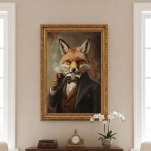 May include: A framed portrait of a fox in a suit, smoking a pipe. The fox is depicted with a bow tie and a dark suit jacket over a brown waistcoat. The artwork is presented in a gold, ornate frame, enhancing its classic aesthetic.