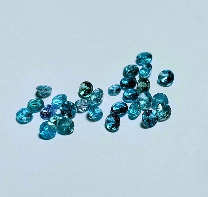 Paraiba Tourmaline Melee / Calibrated  Round Cut 1.2 mm Diameter / Neon Blue / Batalha Mine, Brazil / for halo or custom design.