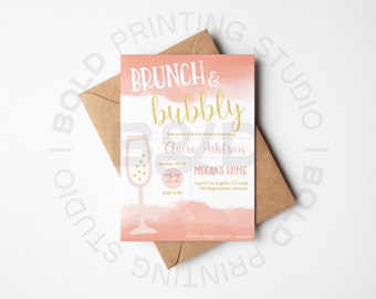 May include: A pink and gold bridal shower invitation with a watercolour background and a champagne flute illustration. The invitation reads "Brunch & Bubbly" and includes the bride's name, date, time, and location. RSVP information is also included.