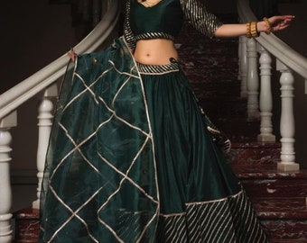 Adorned With Lace Work And Hand-made Gotta Jaal work all Over Dupatta.presenting the  Green Bridal Lehenga Choli set.indian outfits