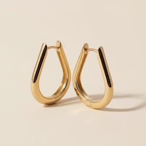 18k Gold Filled Teardrop Hoop Earrings — The Elongated Form. The Warmest Polish. The Most Graceful Hoop.