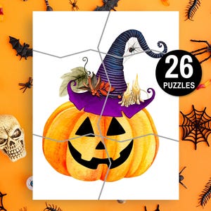 May include: A Halloween-themed jigsaw puzzle showing a pumpkin with a witch's hat. The puzzle is divided into 26 pieces. The background is orange with Halloween decorations, including spiders and cobwebs.