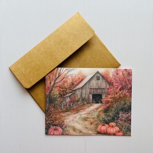May include: A watercolor painting of a rustic barn in a fall setting. The barn is painted in shades of brown and gray, with a red door and a dirt road leading up to it. The trees surrounding the barn are painted in shades of red, orange, and yellow, with pumpkins in the foreground.
