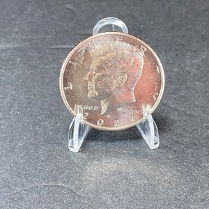 Uncirculated JFK coins have been ordered directly from the U.S. Mint and have never been used so they are pristine in condition.
