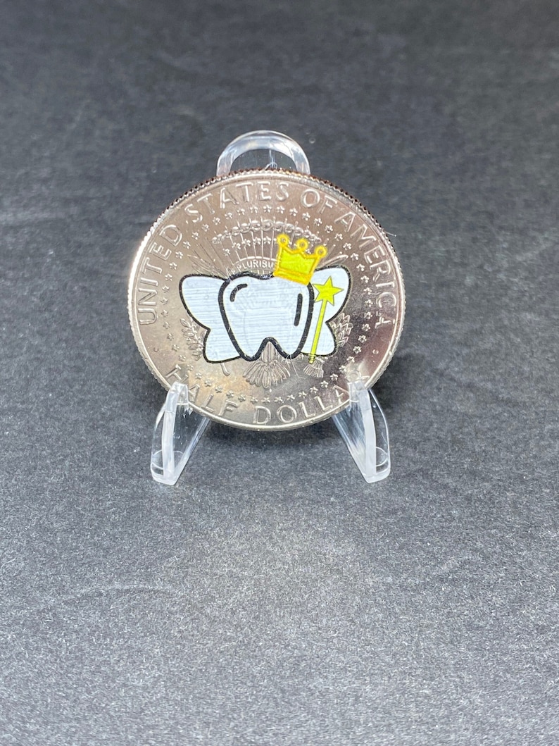 Our uncirculated JFK Tooth Fairy Coin comes in a protective coin holder and packaged in a gift box.