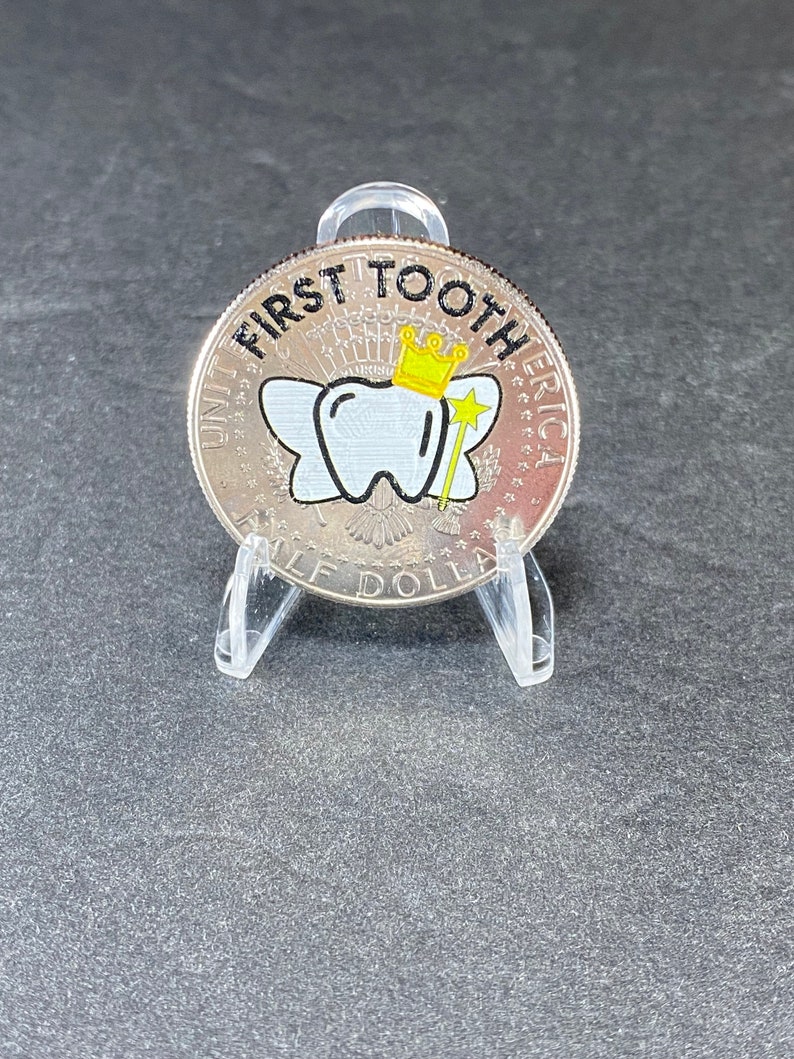 Our uncirculated First Tooth JFK Tooth Fairy Coin comes in a protective coin holder and packaged in a gift box.