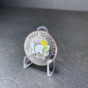 Uncirculated JFK Tooth Fairy coin.