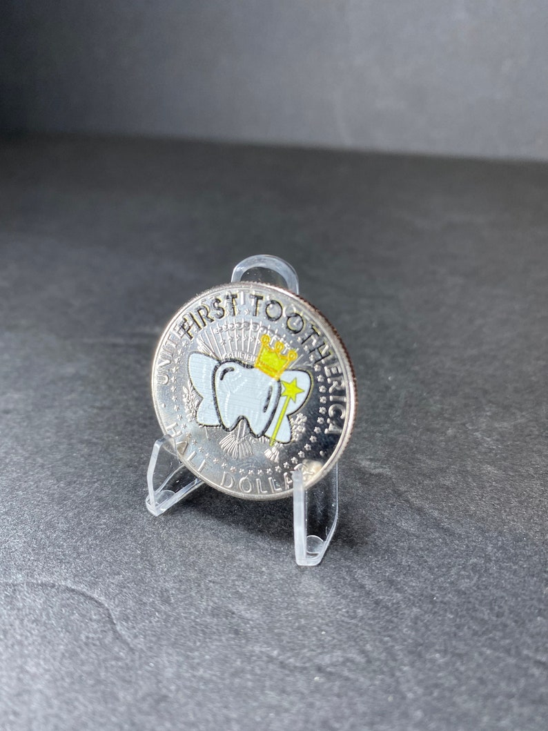Uncirculated JFK Tooth Fairy coin.