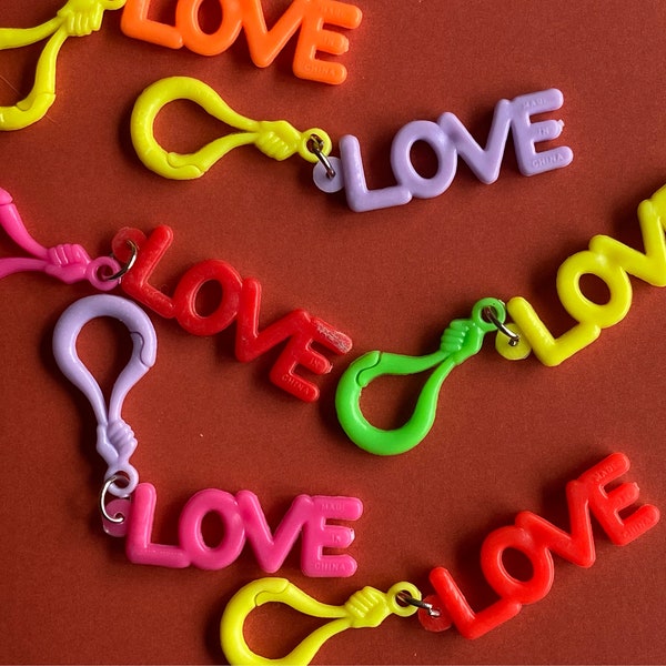 LOVE KEYCHAIN Memphis era plastic multicolored key fob Vintage 80s collectible Valentine's Day Marriage Engagement New old stock