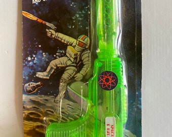 FRICTION RAY GUN Space X Ray Gun 80s Powered with Sound and Sparkling Action Green New old stock Vintage Rare