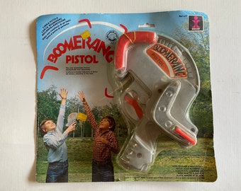 BOOMERANG TOY PISTOL 80s Flying New old stock Vintage toy