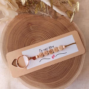 Llavero vas a ser abuelita/abuelo/tia/tio cuentas de madera