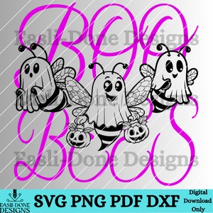 May include: Black and white illustration of three bees dressed as ghosts holding pumpkins. The bees are arranged in a circle with the word "BOO" in large pink letters in the background. The text "Easi-Done Designs" appears twice in pink letters.