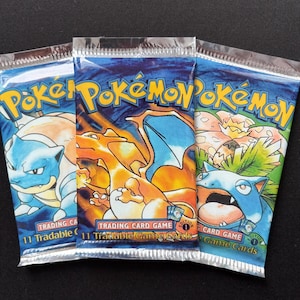Paquetes de refuerzo de exhibición de la primera edición del conjunto base Pokémon