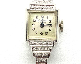 Montre Vintage Suisse LUCERNE Mécanique à Remontage Manuel - Pour Femme - Boîtier Plastique Blanc - état à Réparer Ou Pour Pièces