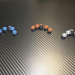 Toyota emblem logo Tire Valve Stem Caps set pack of 4 your choice of color Car Truck SUV Bike Motorcycle