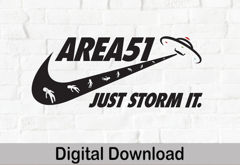 May include: Black and white graphic design featuring a Nike swoosh with the text "AREA 51 JUST STORM IT." A UFO with red, green, and blue accents is flying over the swoosh, with small alien figures trailing behind it.