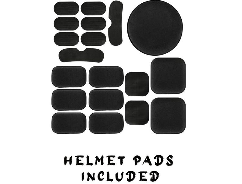 May include: A set of black helmet pads, including a large round pad, several rectangular pads, and a curved pad. The text "Helmet Pads Included" is printed below the pads.