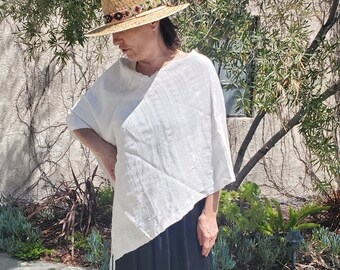 Handwoven Poncho made by Mayan weavers in Guatemala from naturally dyed cotton. White. Silky-soft. Summer Fashion.