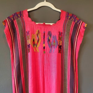 Vintage Huipil with colorful embroidery from Guatemala. Handwoven & hand-embroidered by Mayan Artisans.