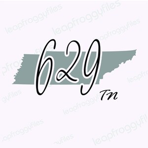 May include: A gray outline of the state of Tennessee with the number 629 written in black cursive script. The text "Tn" is written in black cursive script below the state outline.