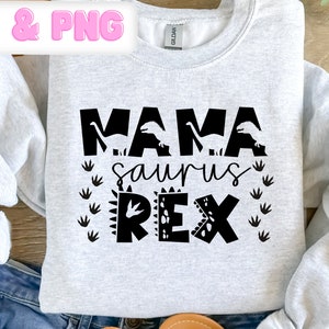 May include: A gray sweatshirt with the text "Mama saurus Rex" in black. The text is surrounded by dinosaur footprints.