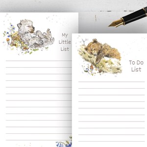 May include: Two white notepad pages with lined paper. The top page has a watercolor illustration of a sleeping wolf cub with the text "My Little List". The bottom page has a watercolor illustration of a sleeping bear cub with the text "To Do List".