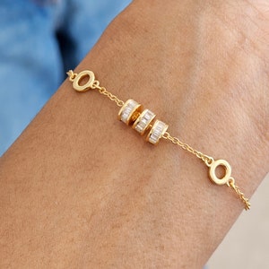 dainty gold baguette charm bracelet