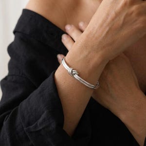 Silver knot bangle, bridesmaid gift, stacking bangle, waterproof non tarnish cuff bangle, gift for her, minimalist jewelry, love knot bangle