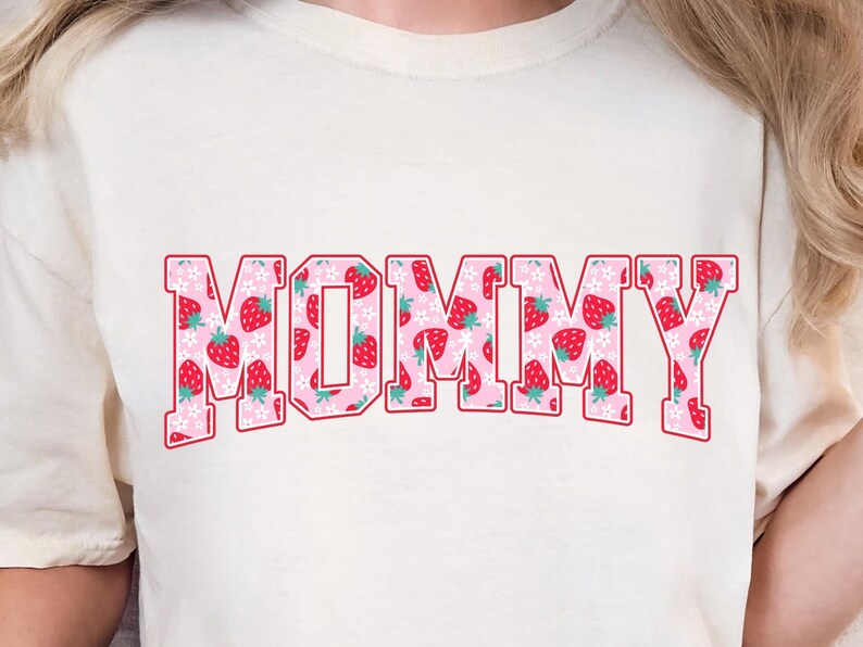 Strawberry-themed retro varsity style Mother's Day PNG shirt designs for sublimation, featuring Mama, Momma, Mini, Gigi, Gram, and Lita in pink red floral fruit print on white t-shirts, digital files for Cricut and heat press crafting, perfect for Mother's Day gifts and matching family outfits on Etsy.