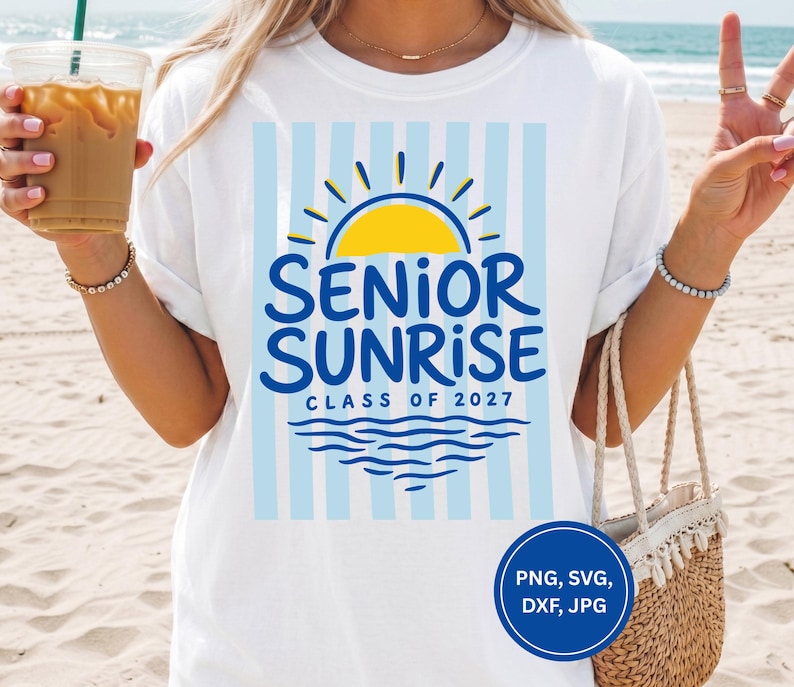 May include: White t-shirt with a blue and yellow graphic that reads "SENIOR SUNRISE CLASS OF 2027". The design includes a sun, waves, and vertical blue stripes. A round blue graphic with file type information is in the bottom right.
