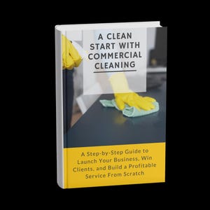 May include: A book titled "A Clean Start with Commercial Cleaning." The cover features yellow gloved hands cleaning a dark surface with a green cloth. The book's yellow band at the bottom has text: "A Step-by-Step Guide to Launch Your Business, Win Clients, and Build a Profitable Service From Scratch."