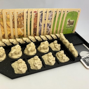 Catan. Organistaur de jeu pour figurine Catan. Update du jeu Catan.