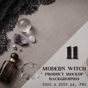 May include: A flat lay featuring a collection of mystical items. Includes a clear crystal ball, amethyst, skull charm, perfume bottle, and a silver bracelet with charms. The text reads "MODERN WITCH PRODUCT MOCKUP BACKGROUNDS".