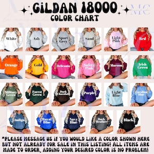 May include: Color chart for Gildan 18000 sweatshirts, showing 20 different colors, including white, ash, sport grey, sand, light pink, red, orange, gold, heliconia, safety pink, maroon, Irish green, military green, forest green, dark chocolate, purple, light blue, Carolina blue, indigo, royal blue, navy blue, dark heather, and black.