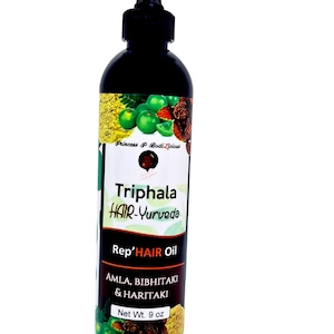 May include: A black bottle of Triphala Hair-Yurveda Rep'HAIR Oil with a green, brown, and yellow label. The label features the text "Triphala Hair-Yurveda Rep'HAIR Oil", "AMLA, BIBHITAKI & HARITAKI", and "Net Wt. 9 oz".