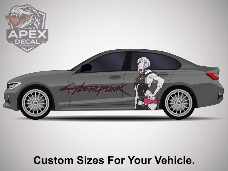May include: A gray car with a Cyberpunk graphic on the side. The graphic features a female anime character in black and pink. The car also has the text "Cyberpunk" in pink and the Apex Decal logo.