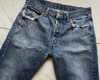 00’s Vintage distressed faded mid wash Levi 501 Jeans Waist 32 inch Leg 29 Inches Vintage levi Jeans Straight leg