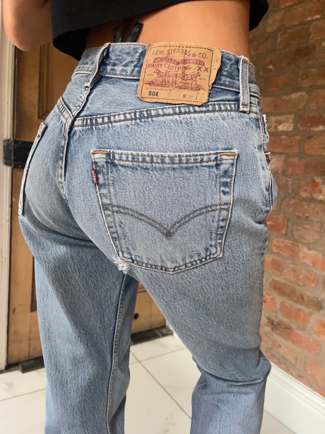 Servizio di modifica delle taglie per jeans Levi's vintage, vita 28, 29