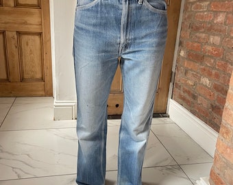 Taille 30, Bein 29, 90er, 90er, orangefarbene Lasche, Levi-Jeans, Vintage-Levi-Jeans in verblasstem Blau, mittlere Waschung, gerades Bein, E34